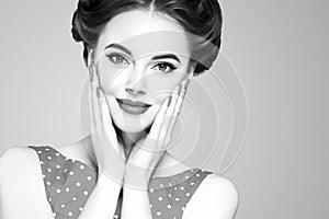 Pin up girl vintage. Wow expressions emotion! Beautiful woman pinup style portrait in retro dress and makeup, manicure nails hands