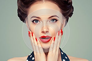 Pin up girl vintage. Wow expressions emotion! Beautiful woman pinup style portrait in retro dress and makeup, manicure nails hands