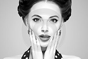 Pin up girl vintage. Wow expressions emotion! Beautiful woman pinup style portrait in retro dress and makeup, manicure nails hands