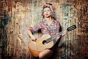 Pin-up with guitar photo