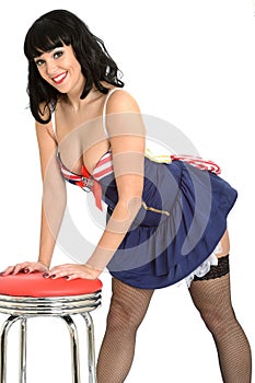 Pin Up Model Wearing Short Sailors Dress with Fish Net Stockings