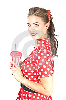 Pin-up stile young woman in red dress