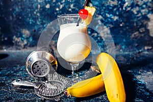 Pina colada alcoholic fresh cocktail served cold with coconut an