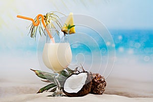 Pina colada cocktail on beach coast photo