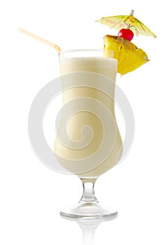 Pina colada coconut cocktail with ice on white background