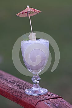 Pina colada drink in outdoor hallway