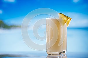 Pinacolada pina colada cocktail on beach