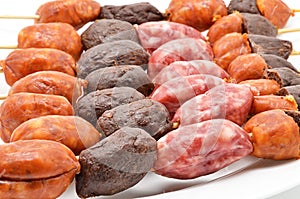Pincho with different types of sausages for the barbecue