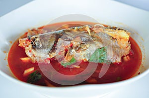 Pindang Patin is Fish soup with sauce Traditional food from Palembang photo