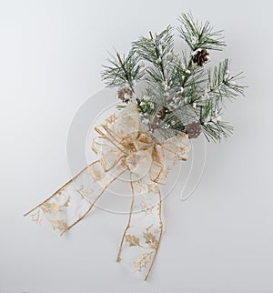Pine Bough Decoration with Sparkly Gold Bow