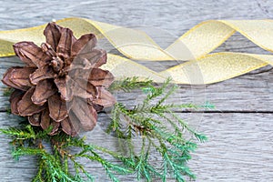 Pine Cone and golden ribbon