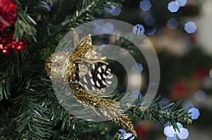 Pine cone on the tree with space to write Christmas message