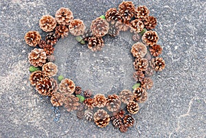 Pine cones in a heart shape for merry christmas