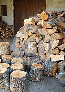 Pine firewood stored for the winter. Warehouse and woodshed in a house in Laza, village in the province of Ourense, Galicia, Spain