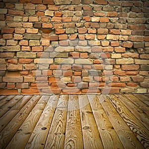 Pine floor and brick wall
