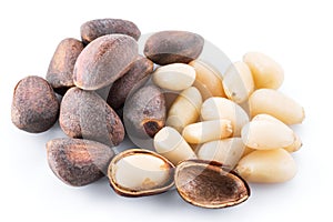 Pine nuts on the white background. Organic food photo