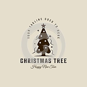 pine tree christmas logo vector vintage illustration template icon graphic design. xmas decoration sign or symbol for celebration photo