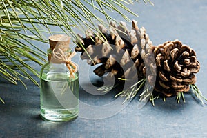 Pine turpentine essential oil in glass bottle