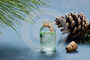 Pine turpentine essential oil in glass bottle