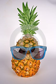 Pineapple (Ananas) wearing sunglasses
