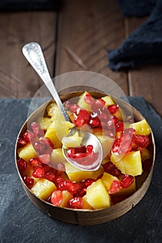 Pineapple chunks and pomegranate seeds