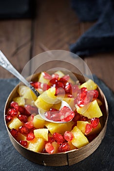 Pineapple chunks and pomegranate seeds