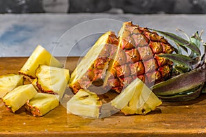 Pineapple cut on chopping board