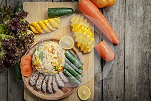 Pineapple fried rice In a wooden dish ,Thailand food