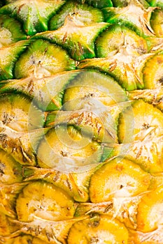 Pineapple fruit close-up. Texture of ananas pattern skin.