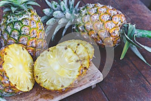 Pineapple fruit on wood table