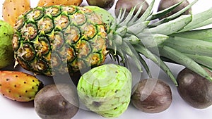 Pineapple and fruits on white background