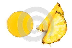 Pineapple juice in a glass with with pineapple slices isolated on white background. Top view