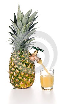 Pineapple juice pouring into glass