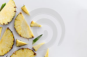 Pineapple juicy yellow slices background. Top view fresh pineapples slice parts