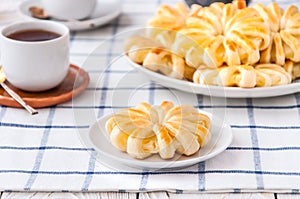 Pineapple ringlets in puff pastry, baked in the form of flowers