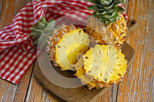 pineapple slice wooden cutting board for food fruit ripe pineapple on background, fresh pineapple tropical fruits summer - top