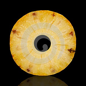 Pineapple slices isolated on black background. Picture of tropical fruit