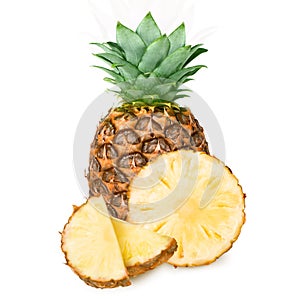 Pineapple with slices isolated on white background