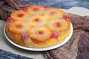 Pineapple upside down cake in rustic setting