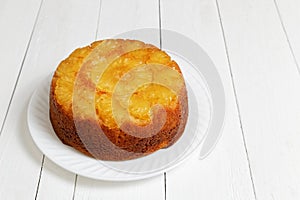 Pineapple Upside Down Cake on white wooden table