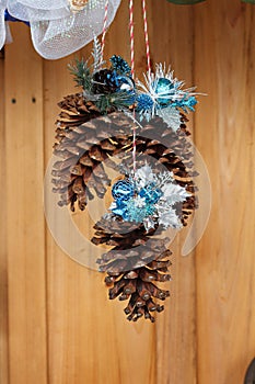 Pinecone Christmas Decoration with Silver and Blue Leaves