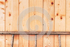 Pinewood wall and wooden ladders as abstract background