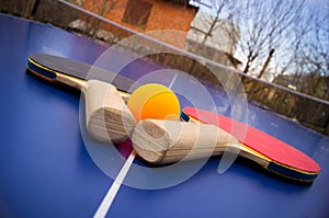 Ping-pong rackets with a ball