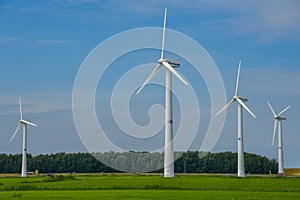 Pingjum, the Netherlands - July 30, 2020. The new windmills in the Dutch landscape