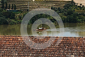 Pinhao village in Portugal. Douro valley and river with boat