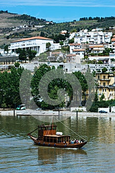 Pinhao village in Portugal. Douro valley and river with boat