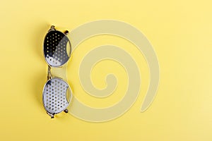 Pinhole glasses on an children eye chart