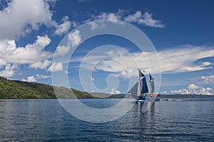 Pinisi Schooner Sails in Calm Water, Raja Ampat