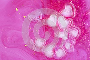 Pink abstract background of ice hearts. Love concept, modern style. Romantic card with frozen heart