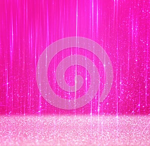 Pink abstract background with texture and blurred lights